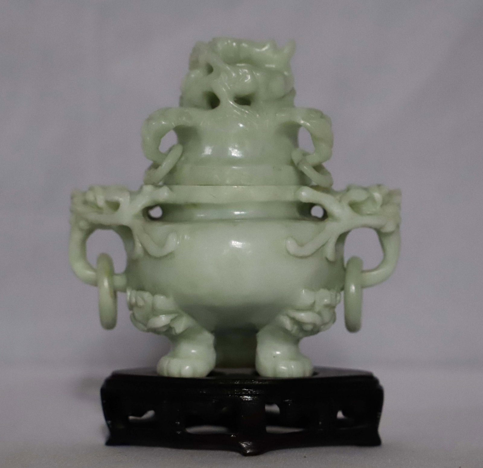 Chinese Censer: Hard stone carved incense burner; Attached to a wood stand; Possibly from the 1940's; Measures approximately H 5 x W 5 x D 3 inches; All three rings on lid have been repaired; See photos. Pick up in D