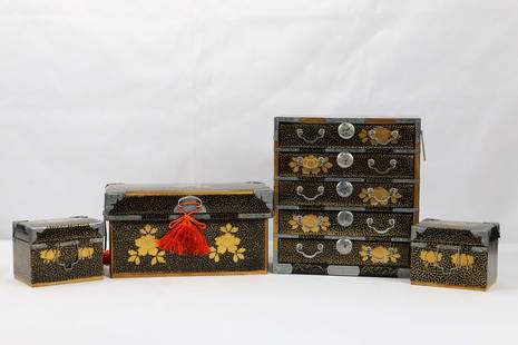 Japanese Wood Lacquered Chests: Small wood trunks / boxes / chests and one set of drawers; Matching painted styles with embellished metal trim; Also included are two carved stands; No maker marks observed; Miniature chest of drawers