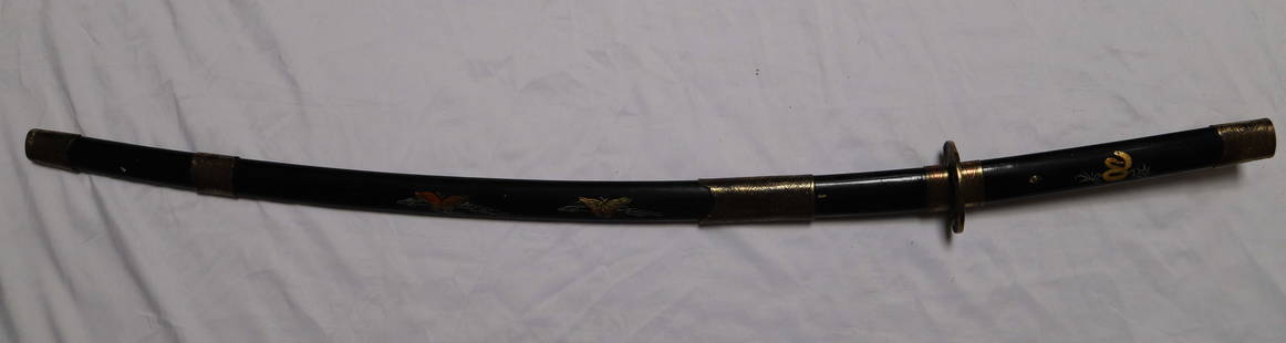 Japanese Sword: Vintage sword with sheath; Steel blade; painted wood handle / sheath with brass detailing; Measures approximately Length 44 inches; Chips in wood;