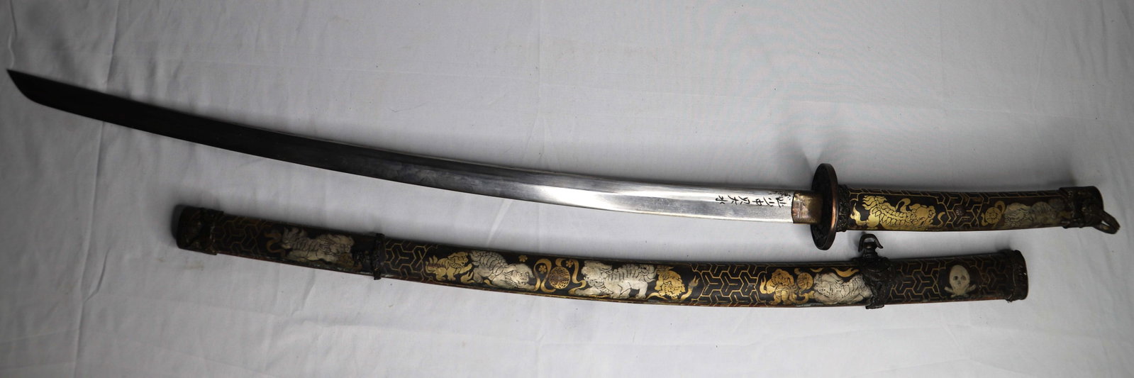 Japanese Sword: Sword and sheath with metal handle; Asian characters on steel blake; Measures approximately L 40 inches; Wear on sheath and handle; Blade has nicks; See photos. Pick up in Denver