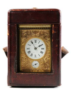 French Carriage Clock: Brass carriage clock with beveled glass and leather carrying case; Marked "Made in France"; Case is marked "Black, Starr & Frost"; Clock measures approximately H 6 x 4 W x D 3 inches; Working conditio