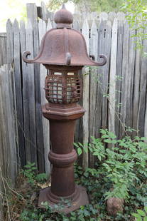 Garden Lantern: Asian style garden lantern; Lantern is constructed in three pieces - the base separates from the lantern portion and the lantern separates into two pieces; Currently wired with a light inside; No make