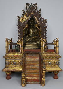 Thai Shrine: Wood sculpture of a Thai shrine with a medal Buddha, possibly brass; Buddha and stairs are not attached; No maker mark observed; Measures approximately H 20 x W 12 x D 15 inches; Wood and metal show w