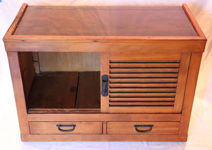 Japanese Tansu Chest: Vintage Japanese Tansu chest; Wood chest with glass top and metal hardware; Features two sliding cabinet door and two drawers; Circa 1930's; No maker marks observed; Measures approximately H 25 x W