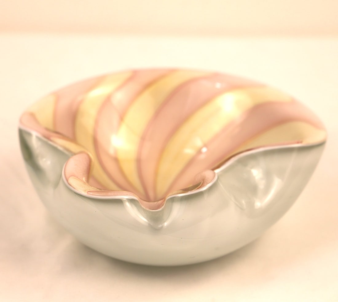 Murano, Glass Bowl: Mid Century Modern Murano bowl designed by Alfredo Barbini; Cream and pink colored swirl pattern with gold colored flecks on inner surface; No maker mark observed; Measures approximately H 2 1/2 x w 7