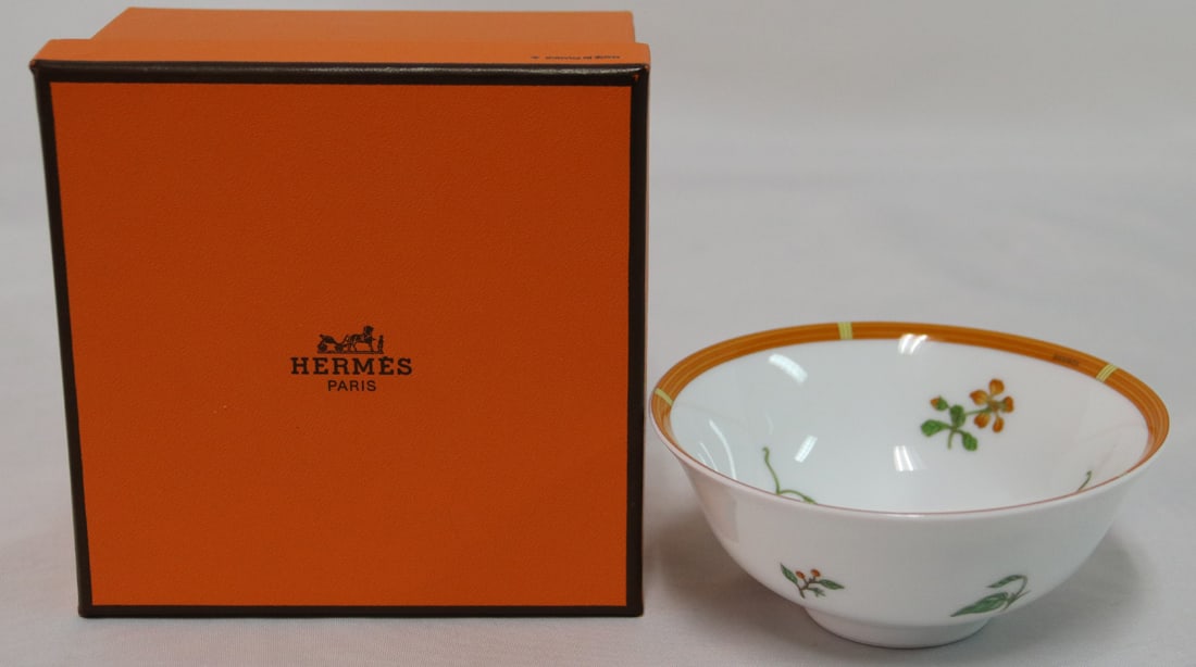 Hermes, Bowl: Porcelain bowl in the La Siesta pattern by Hermes; Item in original box; Measures approximately H 2 1/4 x 4 1/4 Diameter inches across the top; No damage observed; Saucer not present. See photos