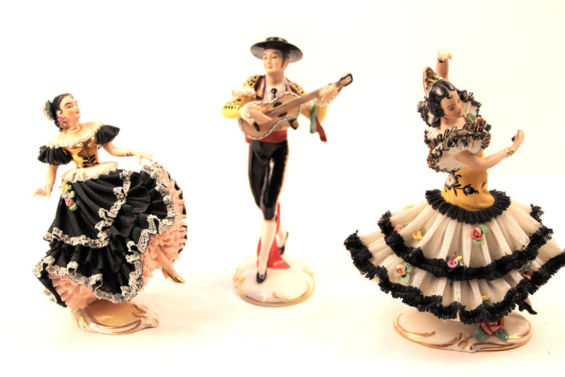Dresden, Germany, Figurines: Three Spanish style figurines; The lady in the black dress with the pink crinoline is marked "Dresden Germany" on the bottom; The one with the white flowered skirt is marked "Handgemalt Germany" on th