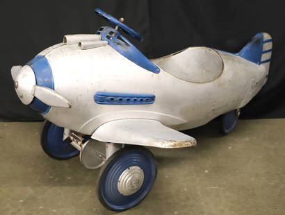 Vintage Pedal Airplane: Vintage pedal car/airplane; Propeller rotates when pedaled; Possibly designed by Viktor Schreckengost and manufactured by Murray, but no mark observed; Measures approximately H 26 1/2 x W 38 x D 46 1/