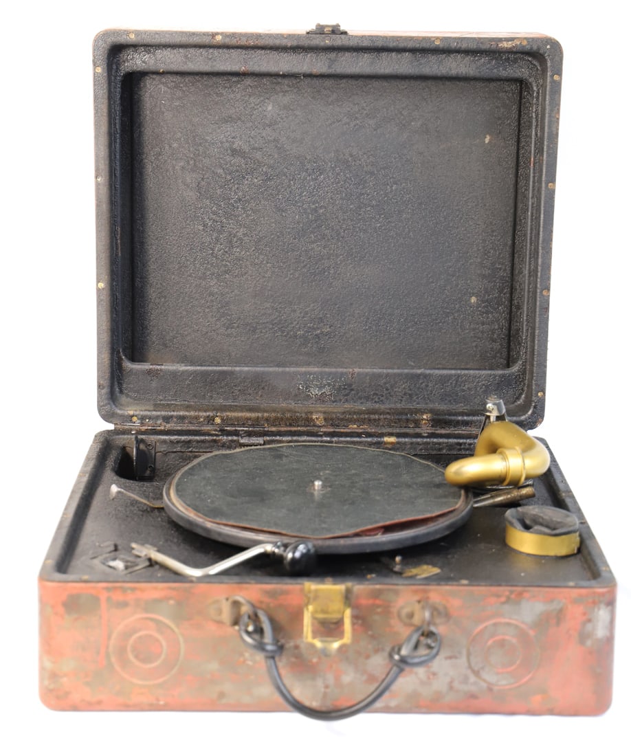 Antique Victrola: Metal case and turntable with crank; No maker mark observed, but consistent with Victrola style; Case measures approximately H 6 x W 16 1/2 x D 14 inches; Handle has been replaced with homemade thick 