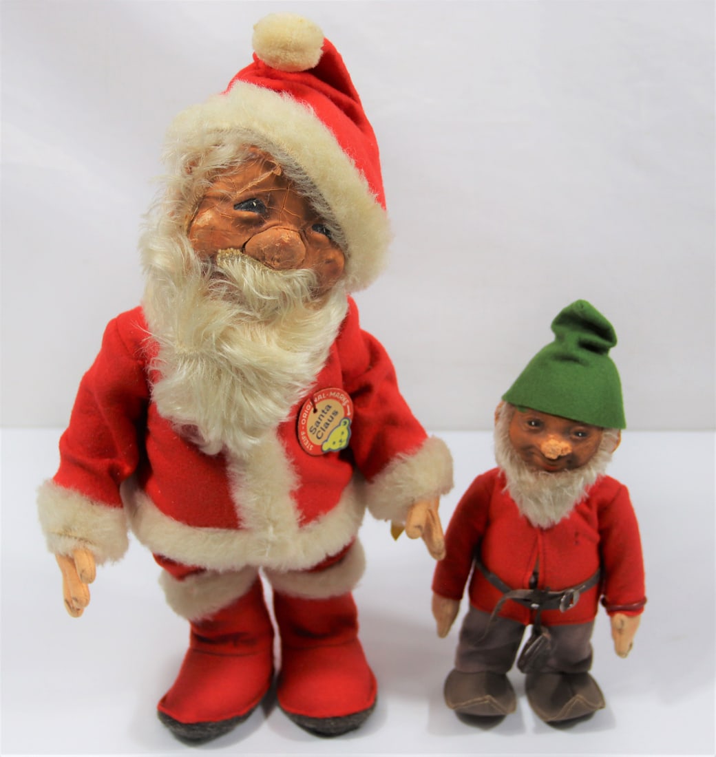 Steiff, Vintage Santas: Two vintage Steiff stuffed Santas both have Steiff tags; Tallest measures approximately H 13 1/2 inches; Both have damage to faces, cracking and peeling; Smaller one has damage to neck. See photos