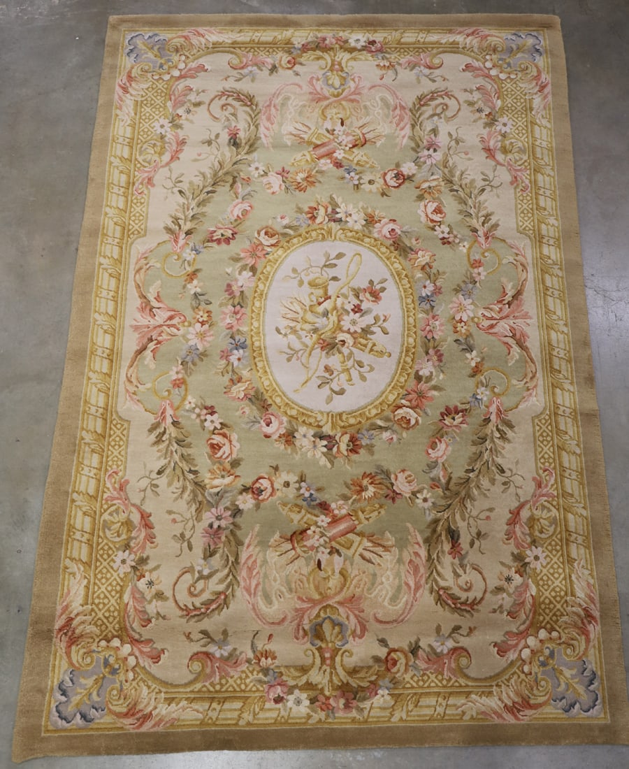 Wool Area Rug: Wool area rug/carpet; Floral design; No fringe; No maker mark observed; Measures approximately H 8' x W 5'; Carpet is in used condition; See photos