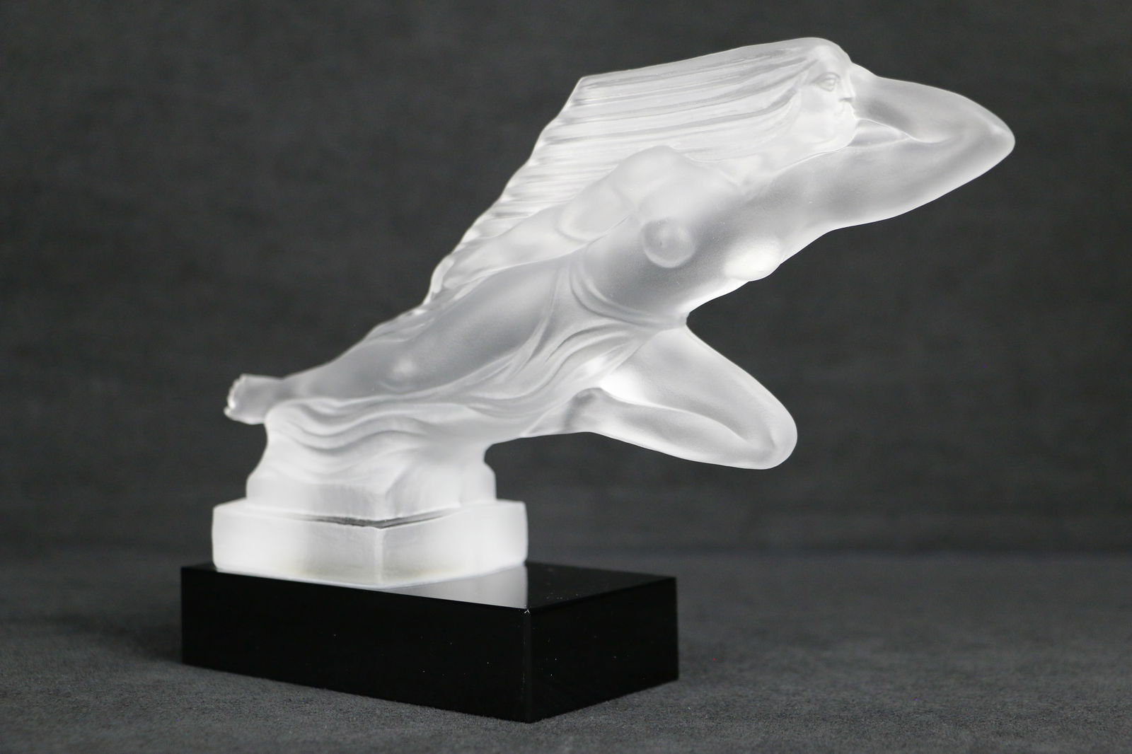 Art Deco, Bohemian Hood Ornament: Frosted crystal figurine, car ornament, in the style of Lalique by H. Hoffman; No maker marks observed; Measures approximately H 6 x W 8 1/2 x D 2 1/2 inches; Small chip on one corner. See photos (T1)