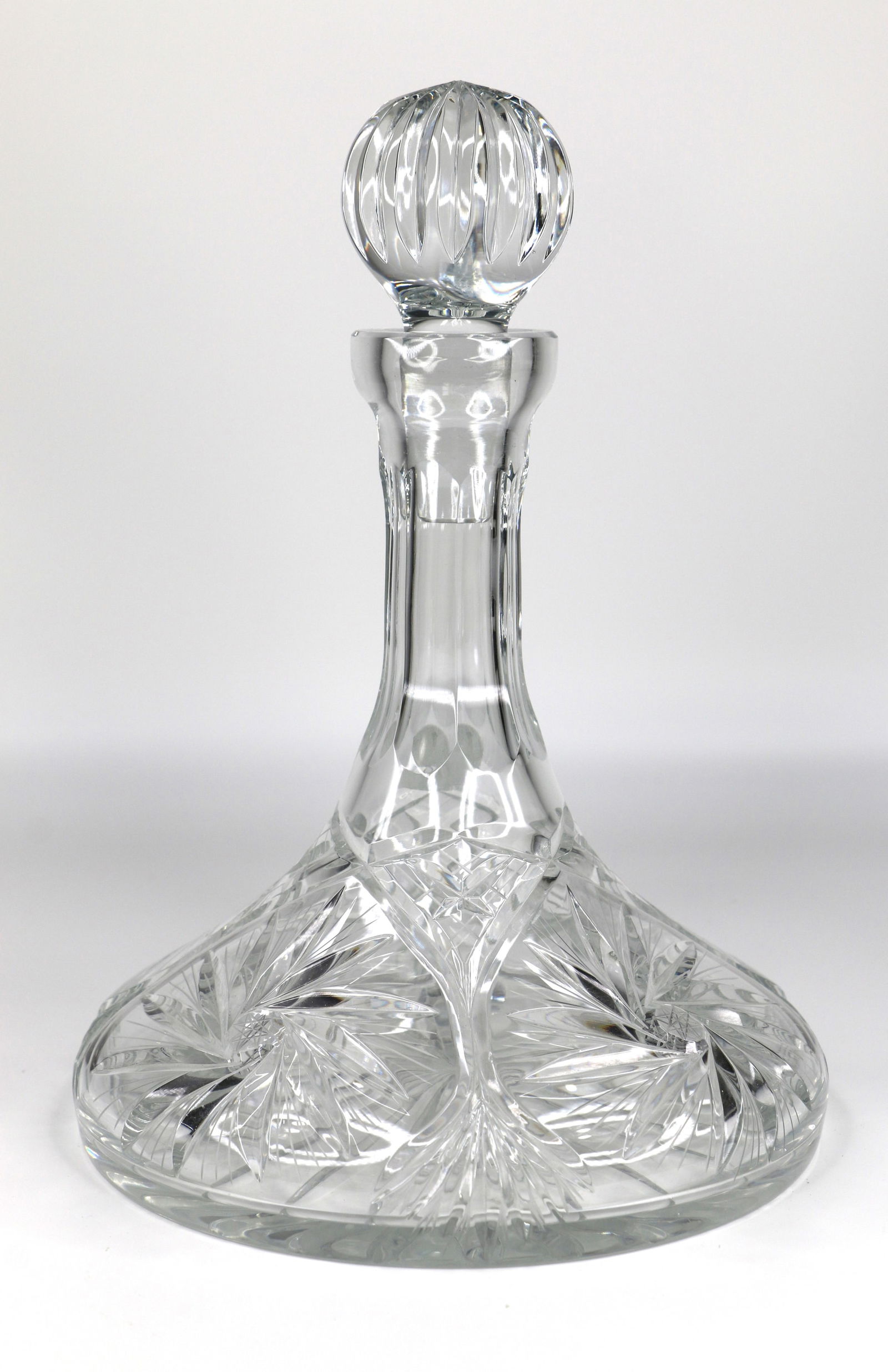 Polonia, Ships Decanter: Cut crystal decanter with stopper; Made in Poland; Measures approximately H 9 1/2 x Diameter 7 1/4 inches; No damaged observed. See photos