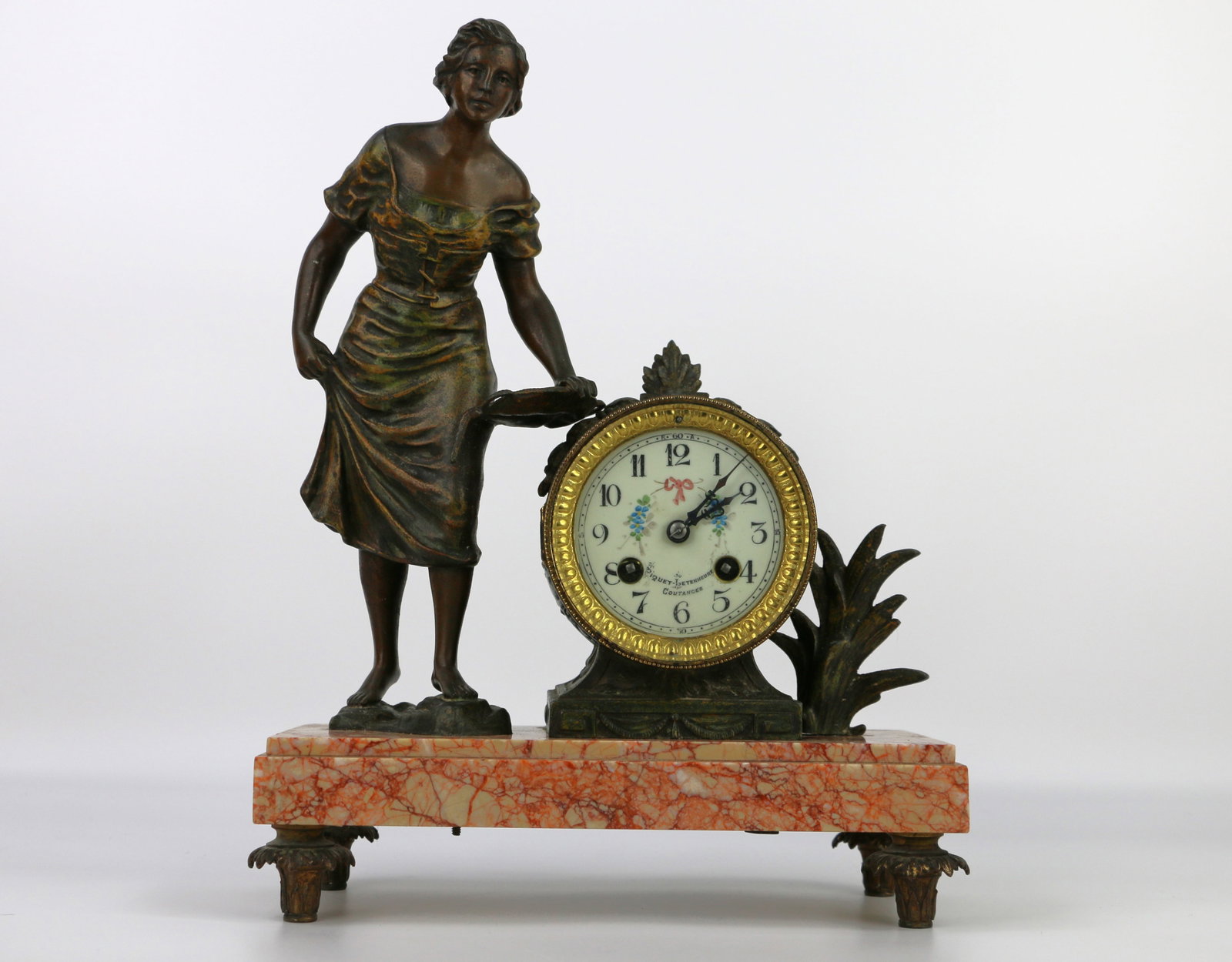 French Mantle Clock: Vintage mantle clock with porcelain face and cast metal figurine on marble base; Dial is marked " Piquet-Letenneure Coutanges"; Internal mechanism is marked "Fisco"; Clock measures approximately H 14 