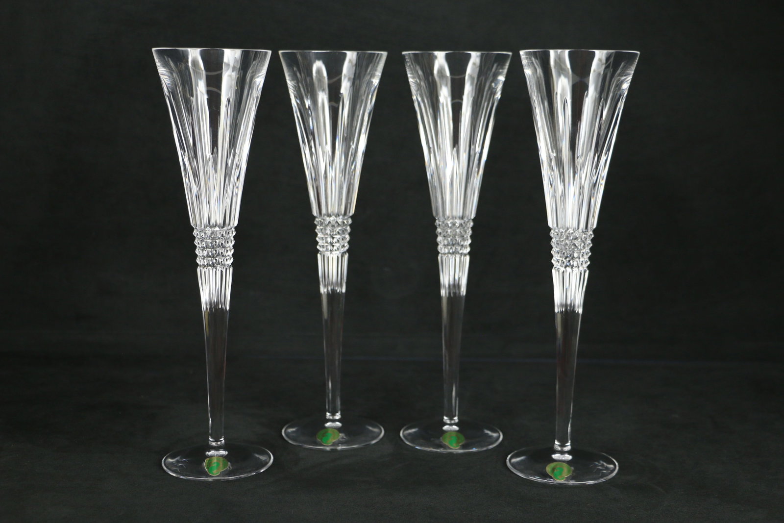 Waterford Crystal, Champagne Flutes: Four crystal champagne glasses in the Lismore Diamond pattern; Each measures approximately H 11 inches; No damage observed. See photos