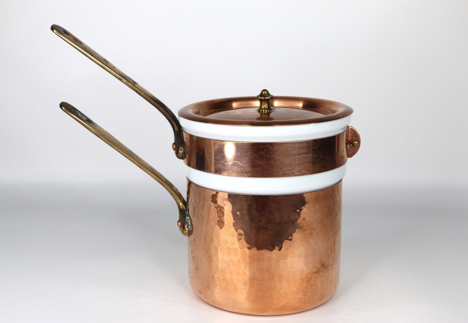 Mauviel, Copper Pans: Three piece copper and porcelain, double boiler; Porcelain is marked "Porcelain Apilco France"; All together it measures approximately H 8 x Diameter 6 3/4 inches; In used condition; Some tarnishing o