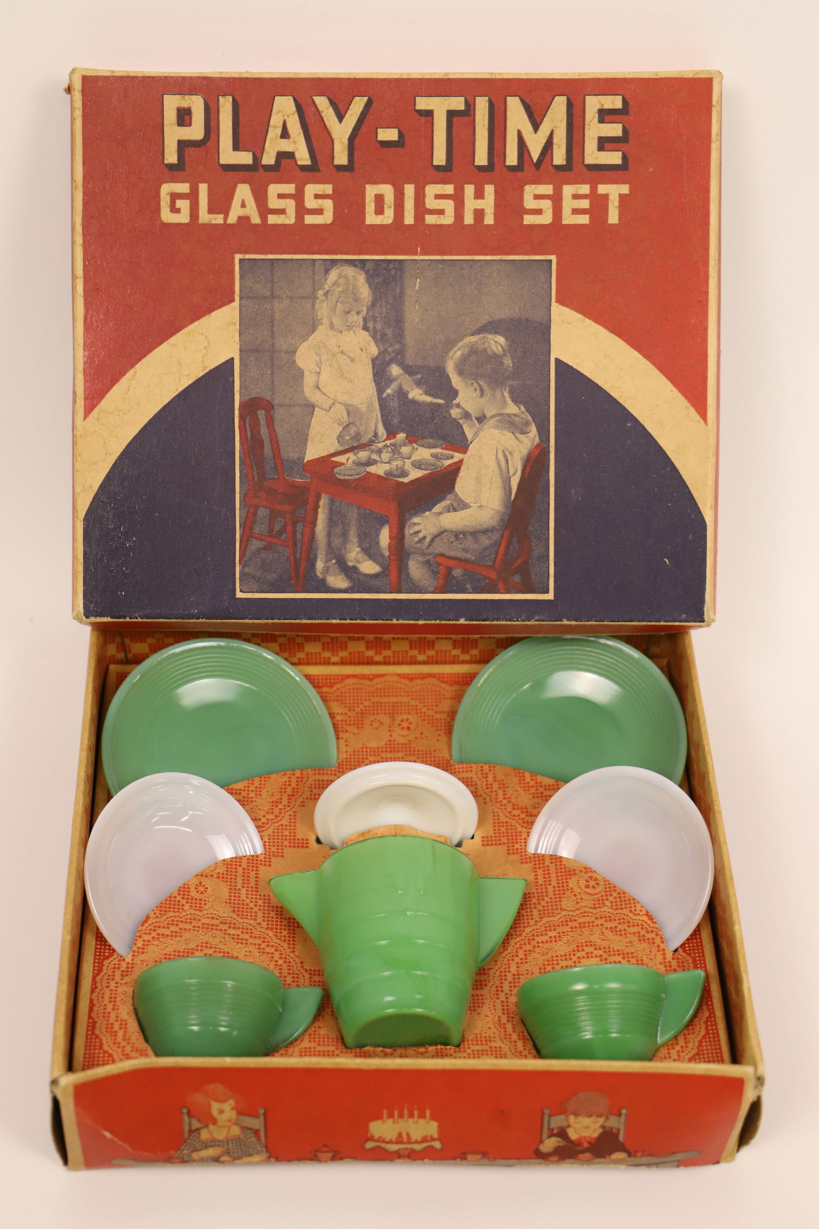 Akro Agate Co., Tea Set: Vintage child's Play-Time Glass Dish Set; Number 132; In original box; Box measures approximately H 2 1/2 x W 8 3/4 x D 7 1/2 inches; Box is damaged. See photos
