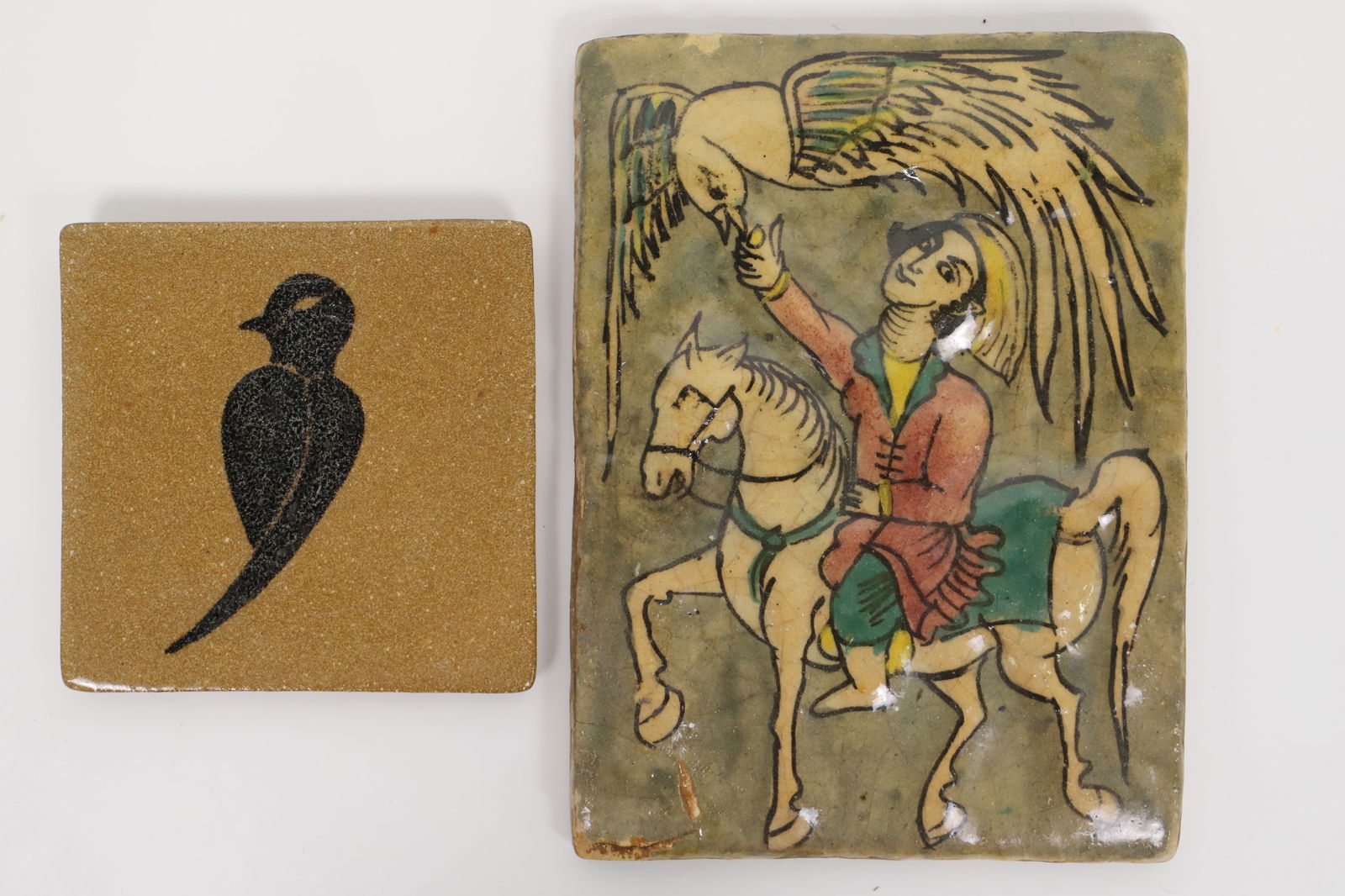 Antique Tiles: Painted tile marked on back "An 18th Century Persian Tile from the Tehran Home"; Clay bird tile has no marks; Largest measures approximately H 8 3/4 x W 6 1/2 x D 3/4 inches; Wear commensurate with ag
