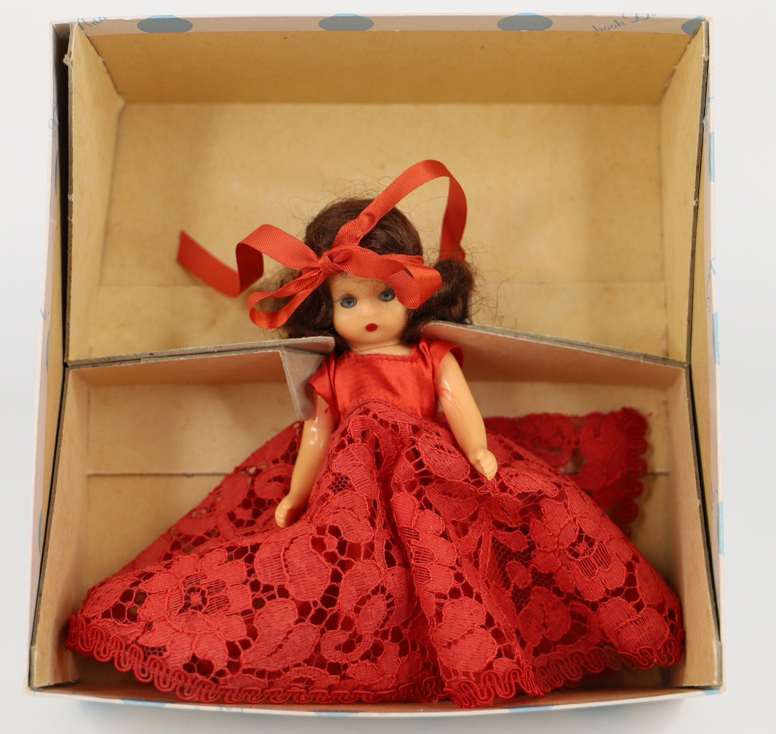 Nancy Ann Storybook Doll: Garden series; "Poppy"; Number 124; Plastic with open/close eyes; Has gold label wrist tag; Stands approximately H 5 1/2 inches; No guarantee doll is in correct box. See photos