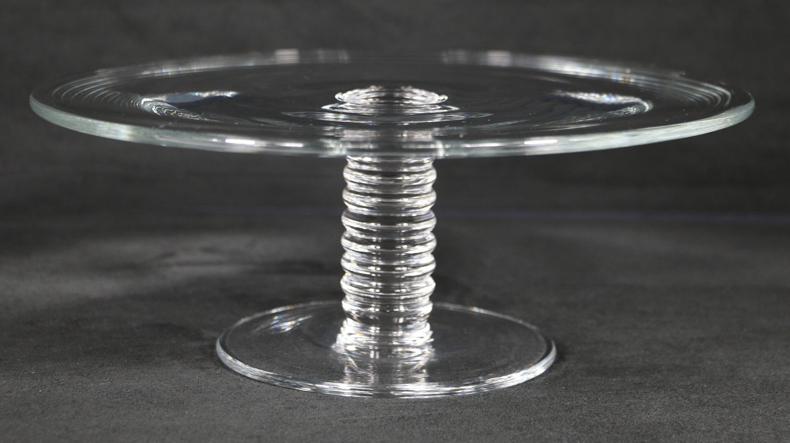 Tiffany & Co., Crystal Cake Plate: Tiffany's pedestal cake stand; Measures approximately H 4 1/4 x Diameter 11 1/4 inches; No damage observed. See photos