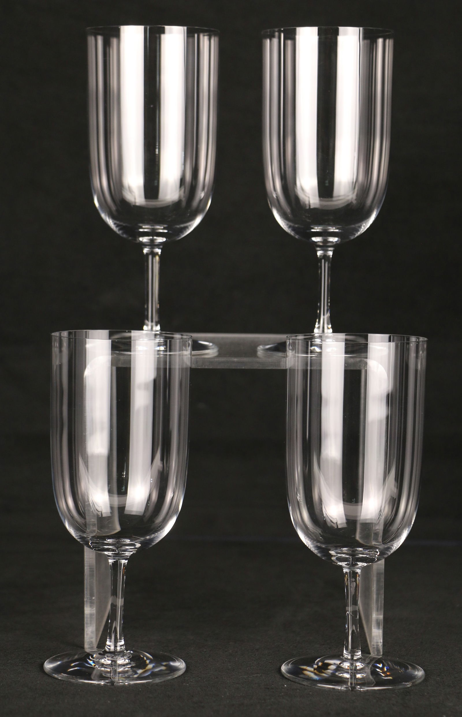Baccarat, Crystal Glasses: Four wine glasses/goblets; Marked on the base; Each measures approximately H 6 1/4 x Diameter 2 3/4 inches; No damage observed. See photos
