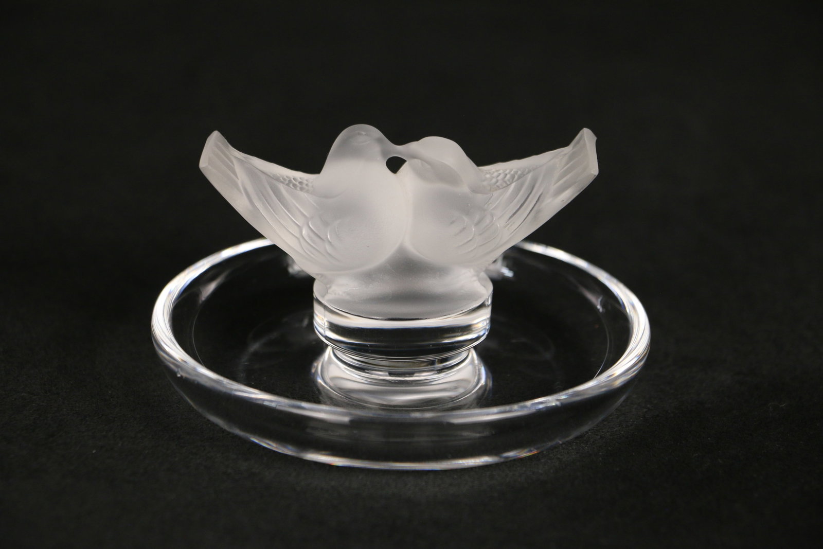 Lalique, Dove Pin Tray: Small glass dish with two birds; Marked "Lalique, France"; on the base; Measures approximately Diameter 3 3/4 inches;Slight scratching on glass. See photos