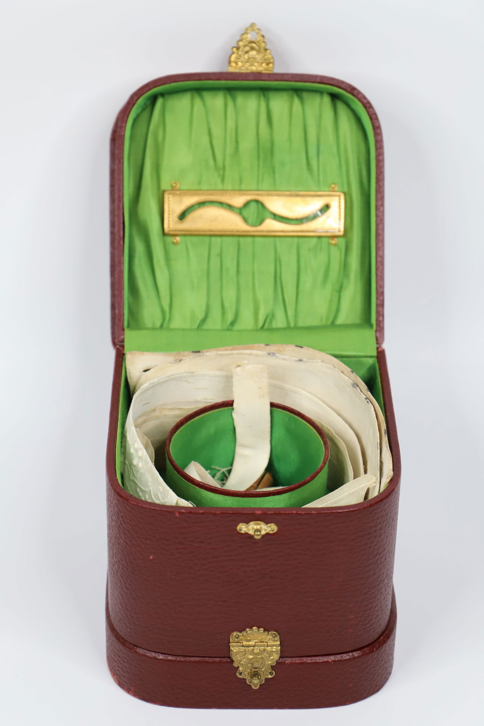 Collar Box, Collars: Ten vintage men's collars in double sided box, possibly leather; Some with ruffled and lace detail; Sewing tools including thimbles and string; Longest collar measures approximately W 16 inches; Stain