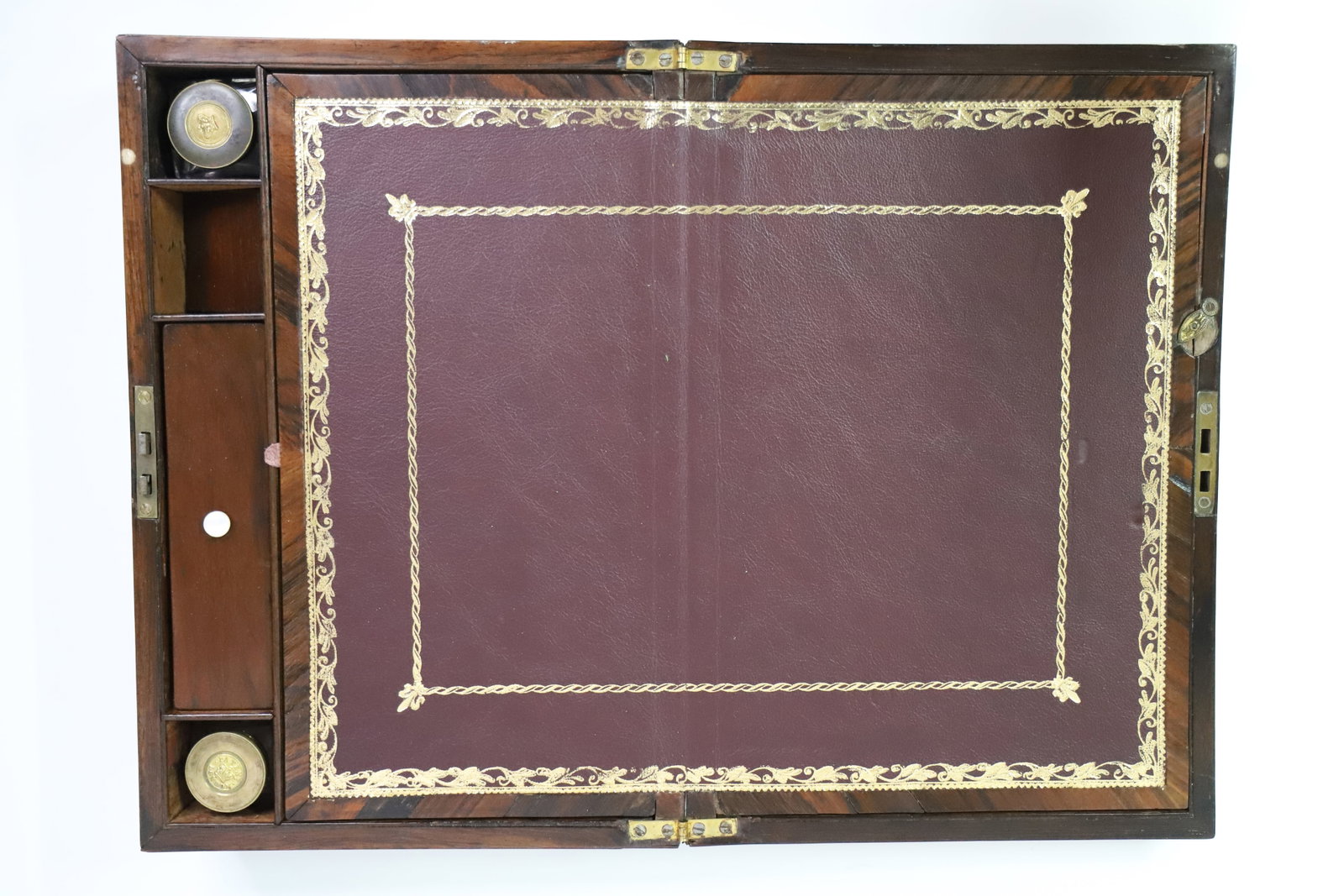 Antique Writing Lap Desk: Vintage travelling writing box/slope with two ink bottles; When open, measures approximately H 3 1/2 x W 14 1/2 x D 19 1/4 inches; Key is not included, chip in the front bottom edge, scuffs and scratc