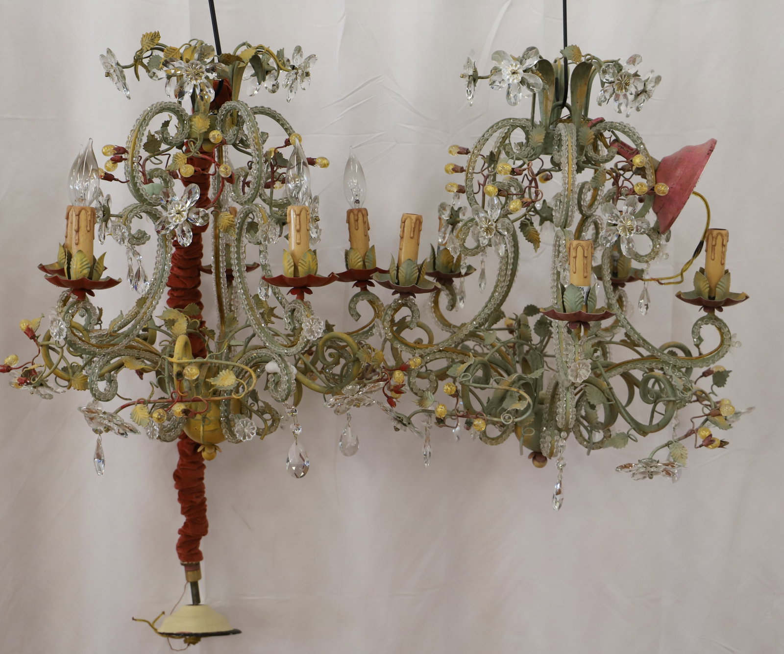 Mechini, Chandeliers: Two metal chandeliers by Mechini; Marked "Made in Italy, glass lustres and beads; With ceiling attachment, the one without velvet rope measures approximately H 27 x W 26 x D 26 inches; Lustres missing