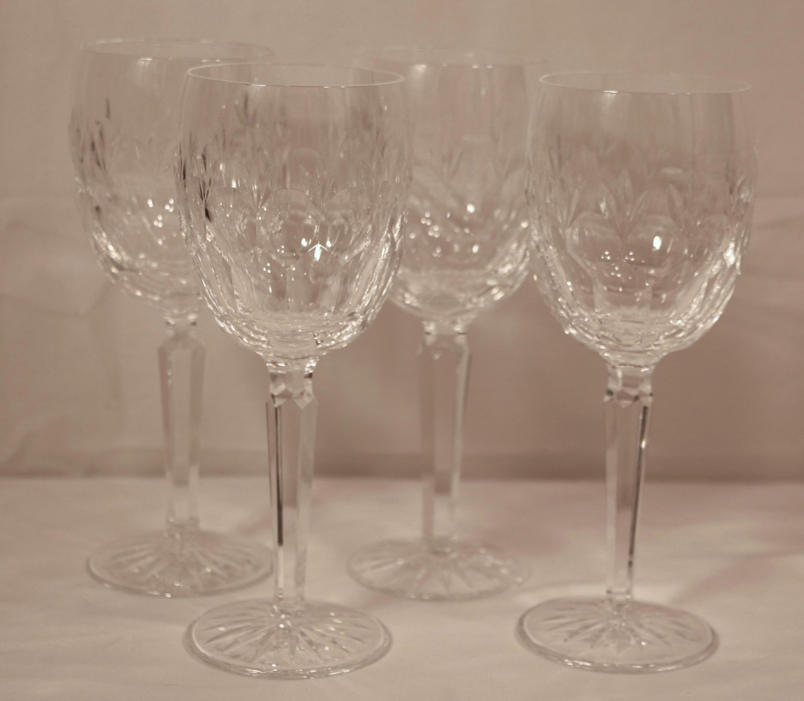 Waterford Crystal, Wine Glasses: Four crystal wine glasses, all marked "Waterford"; Each measures approximately H 7 3/4 x Diameter 2 3/4 inches; No damage observed; See photos. Pick up in Longmont CO