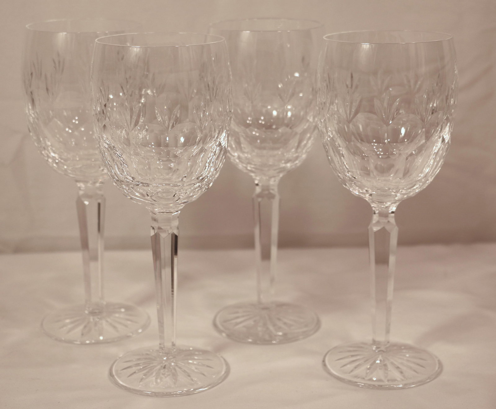 Waterford Crystal, Wine Glasses: Four crystal wine glasses, all marked "Waterford"; Each measures approximately H 8 1/2 x Diameter 3 inches; No damage observed; See photos. Pick up in Longmont CO