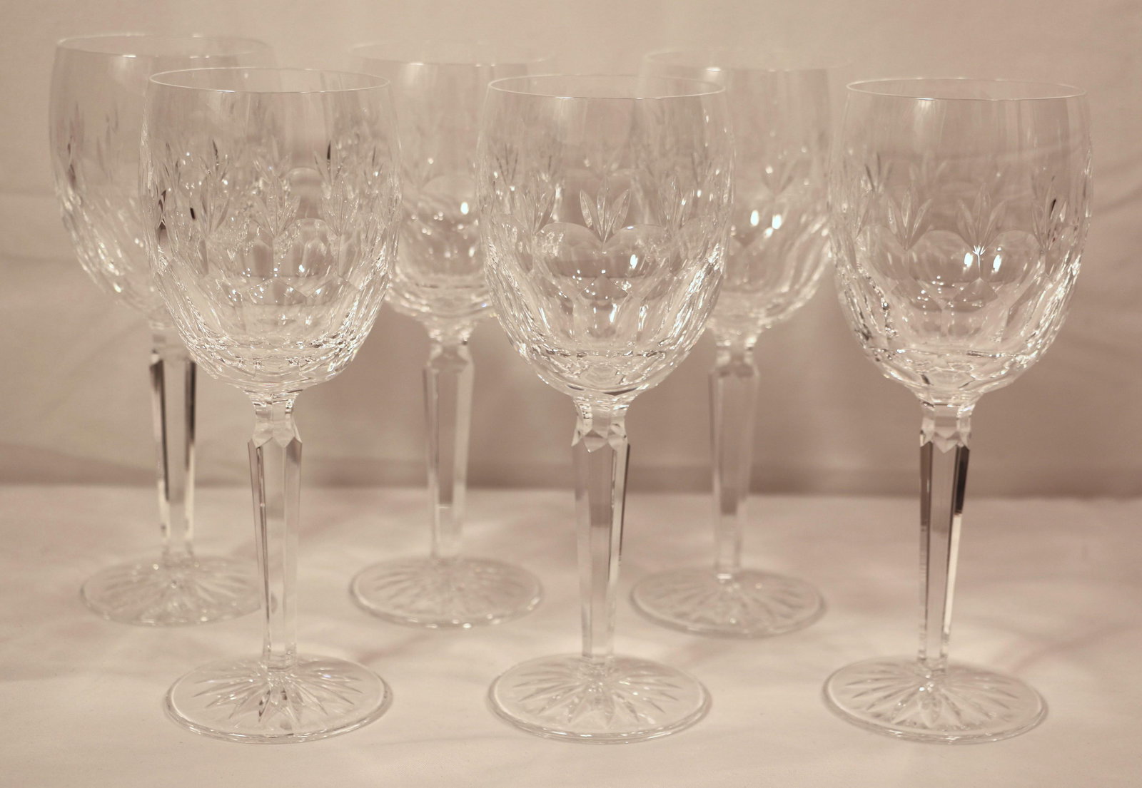 Waterford Crystal, Wine Glasses: Six crystal wine glasses, all marked "Waterford"; Each measures approximately H 8 1/2 x Diameter 3 inches; No damage observed; See photos. Pick up in Longmont CO