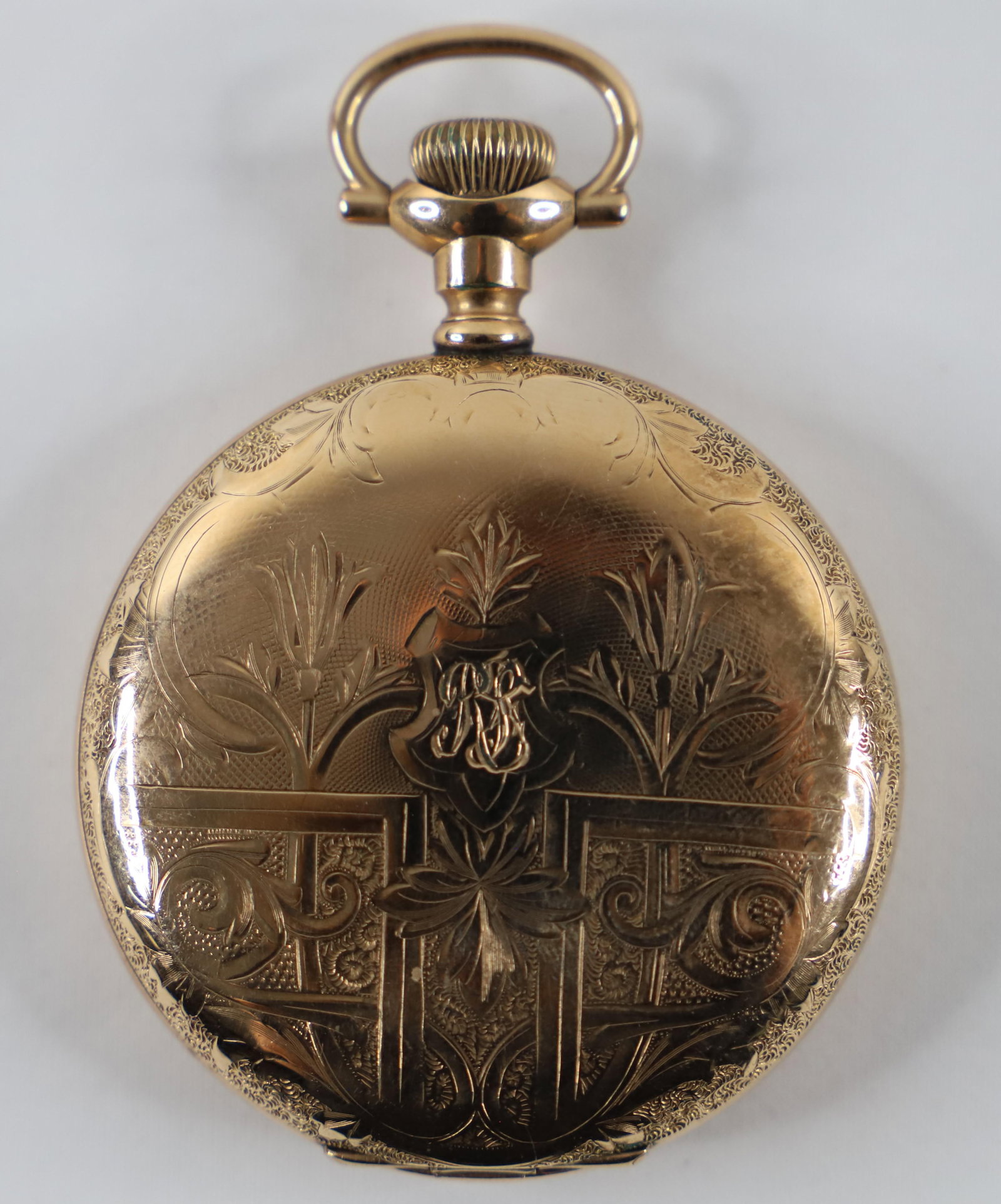 Illinois, Pocket Watch: Vintage pocket watch by Illinois with engraved design on front and back; Case number 2175992; Measures approximately Diameter 2 inches; Preowned item with wear commensurate with age; Working condition
