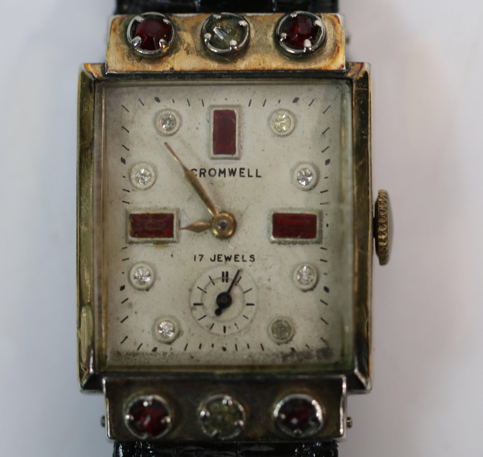 Cromwell, Vintage Watch: Vintage wrist watch by Cromwell with 17 jewels, separate second hand and rhinestone accents on face and outer edges; Yves Laffond leather band; Measures approximately H 1 1/4 x W 3/4 inches, band meas