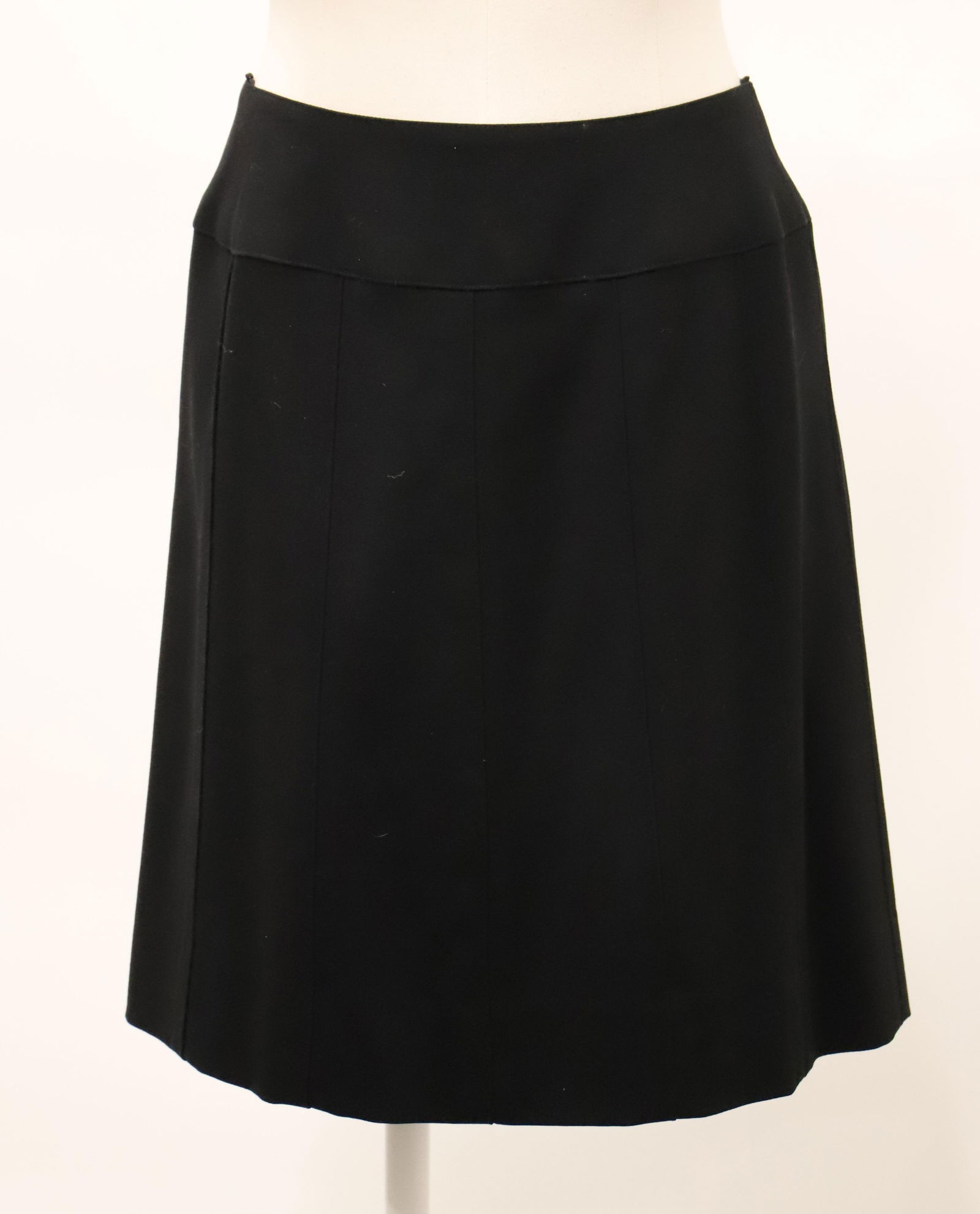Chanel, Wool Skirt: Ladies wool skirt with silk lining, fitted waist with flair to skirt; Back zipper with button over hook and eye; Size FR 40; Preowned, no damage observed. See photos (Please note, this item has not be