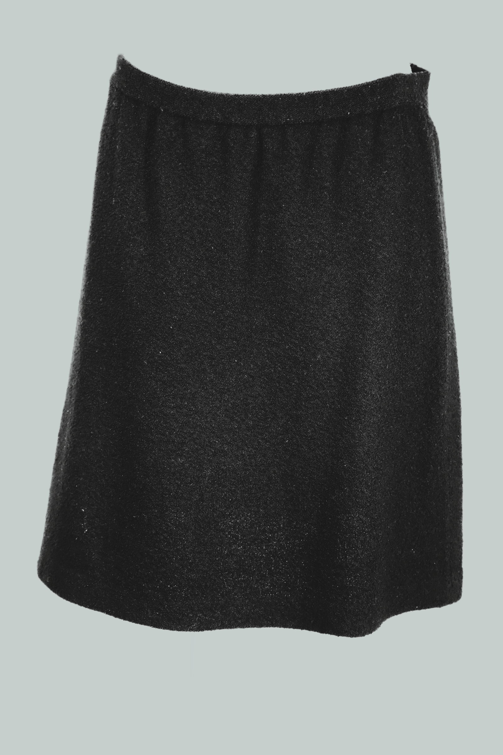 St. John, Knit Skirt: Ladies black knit skirt, has a flair; Fabric not listed; Size 4; Preowned, no damage observed. See photos (Please note, this item has not been authenticated)