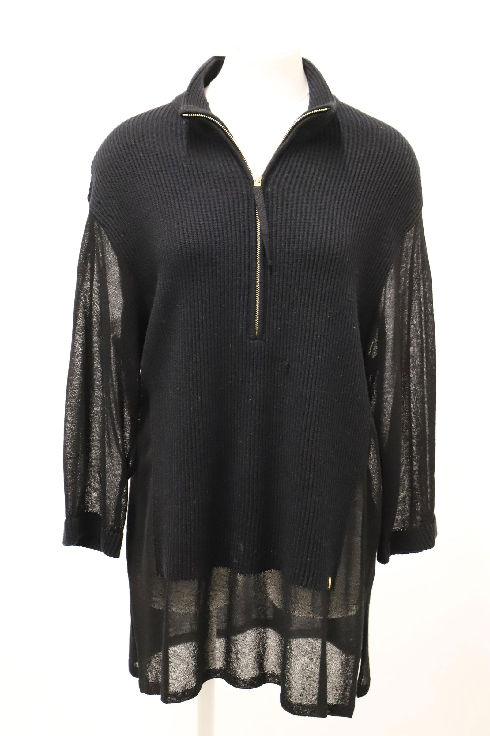 Escada, Sweater: Ladies knit sweater, tunic style, with zipper down front, shear knit on arms, sides and bottom; Size M, length measures approximately 34 inches; Fabric label has been removed; Preowned, pulls in knit,