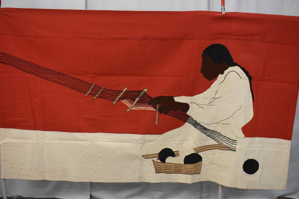 HUTCHINS Pat (Canadian) - WALL HANGING: Hand crafted thick canvas designs stitched on thick canvas depicting indigenous weaver in Mexico. Made to hang on wood dowling. Size: 48 x 83 1/2"