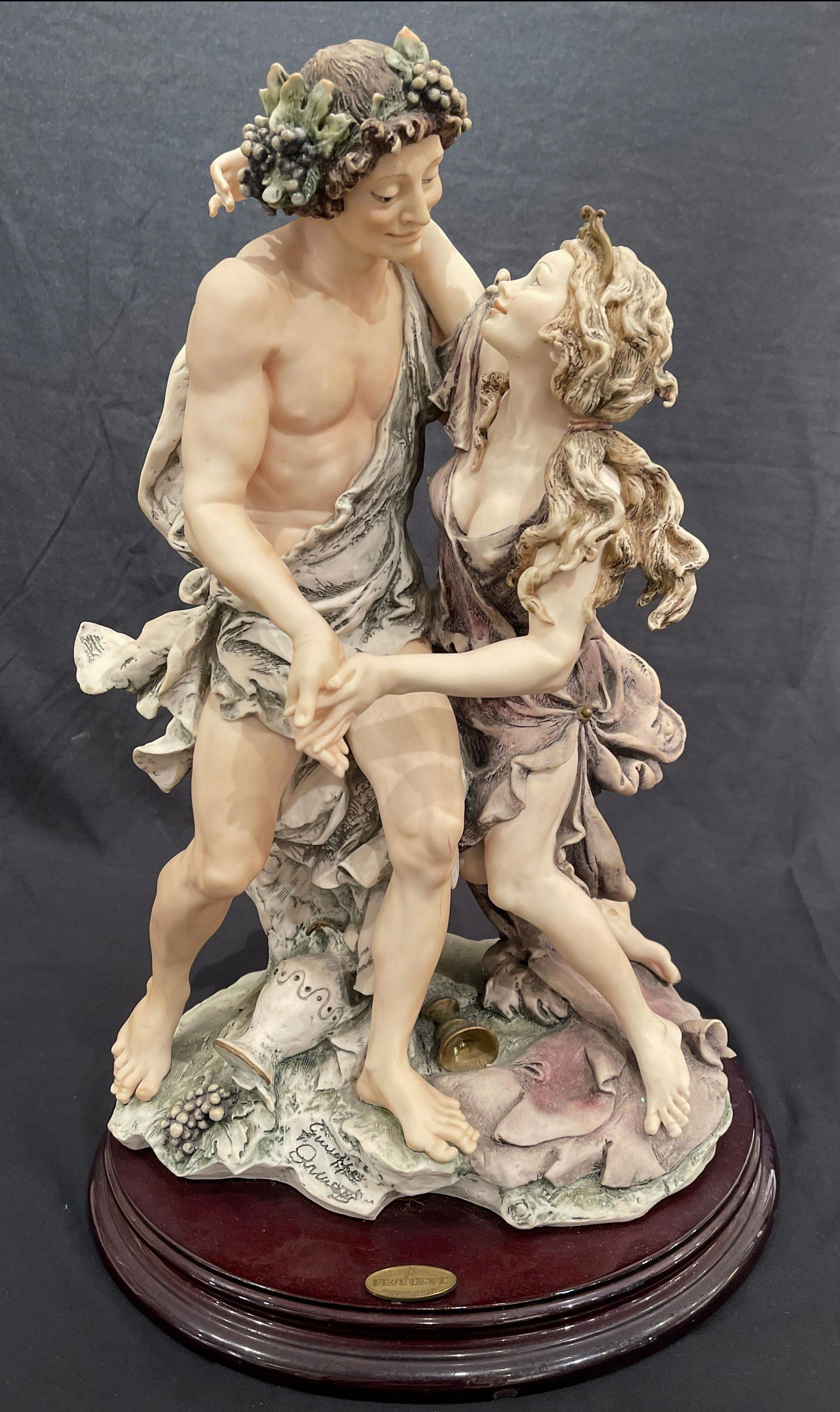 Giuseppe Armani "Bacchus and Arianna" Signed: Artist: Giuseppe Armani Title: Bacchus and Arianna Medium: Figurine Art Dimensions: 12 H inches Framed Dimensions: ARTIST BIO: Giuseppe Armani was born in C