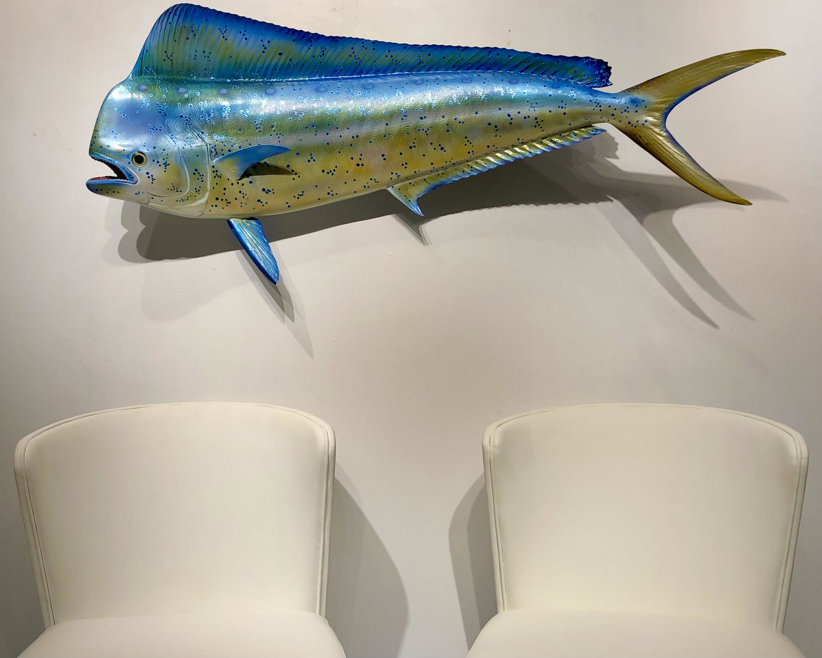 Lance Lyons "Dorado" Signed: Artist: Lance Lyons Title: Dorado Medium: Fiberglass Art Dimensions: 19 H x 41 W x 10 D inches