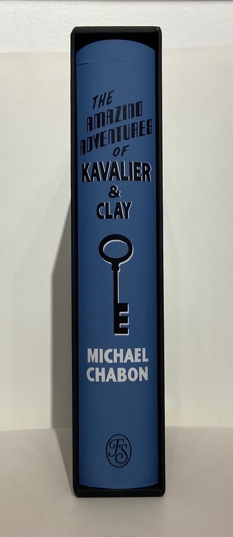 Folio Society - Michael Chabon "Amazing Adventures of Kavalier & Clay": Presenting this Michael Chabon Book: "Folio Society - Michael Chabon "Amazing Adventures of Kavalier & Clay"". This piece, measuring 10 x 6.75 x 2 inch, is available at auction on LiveAuctioneers. Art