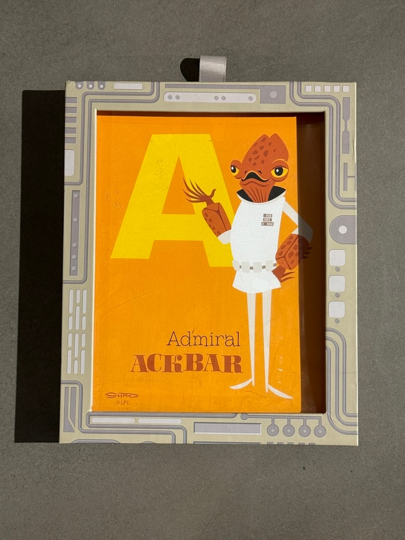 Shag (Josh Agle) - Star Wars Artist Series Alphabet, 2020 3D Shadowbox: Presenting a Printed Art Multiple Presented in Shadowbox by Josh "SHAG" Agle: "Shag (Josh Agle) - Star Wars Artist Series Alphabet, 2020 3D Shadowbox". This work, measuring 8.25 x 10.25 x 1.25 inch, i
