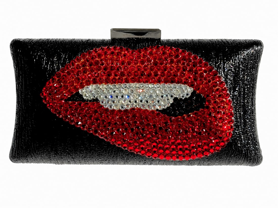 Mercedes Brunelli Jeweled Lips Clutch, Handmade in America, Swarovski Crystal: Presenting this Mercedes Brunelli work: "Mercedes Brunelli Jeweled Lips Clutch, Handmade in America, Swarovski Crystal". This piece, measuring 3.75 x 2 x 7.5 inch, is available at auction on LiveAucti