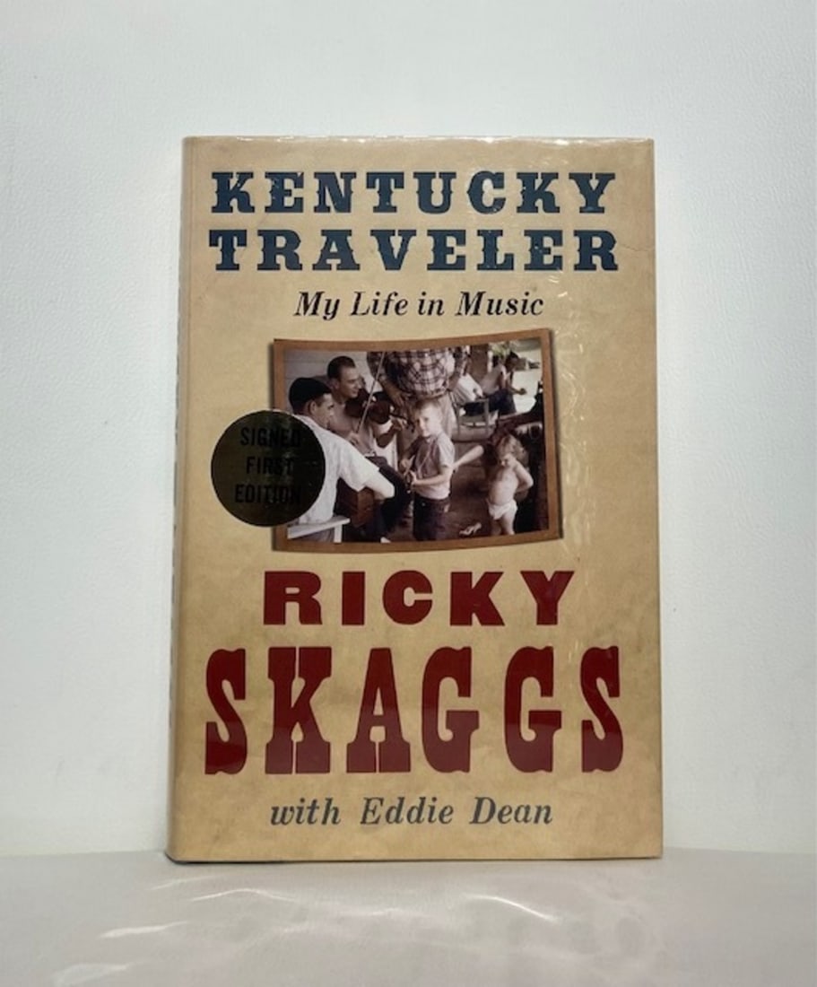 Ricky Skaggs "Kentucky Traveler" Signed 1st Edition: Presenting this Ricky Skaggs Book: "Ricky Skaggs "Kentucky Traveler" Signed 1st Edition". This piece, measuring 9.5 x 6.5 x 2 inch, is available at auction on LiveAuctioneers. Artist: Ricky Skaggs Tit