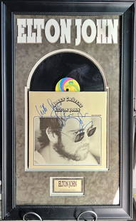 Signed Elton John Honkey Chateau Plaque: Signed Elton John Honkey Chateau LP Plaqueis a framed collectible and signed by the named artist. Due to the reflective nature of the glass, some textures viewed in the image may just be a