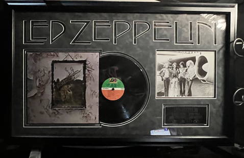 Signed Led Zeppelin Zoso LP Plaque: Signed Led Zeppelin Zoso LP Plaqueis a framed collectible and signed by Robert Plant, Jimmy Page, John Bonham, John Paul Jones. Due to the reflective nature of the glass, some textures viewed in the