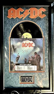 Signed AC DC Let There Be Rock LP Plaque: Autographed AC DC Let There Be Rock LP Plaqueis a framed collectible and signed by Angus Young, Brian Johnson, Malcolm Young, Cliff Williams and Phil Rudd. Due to the reflective nature of the glass,