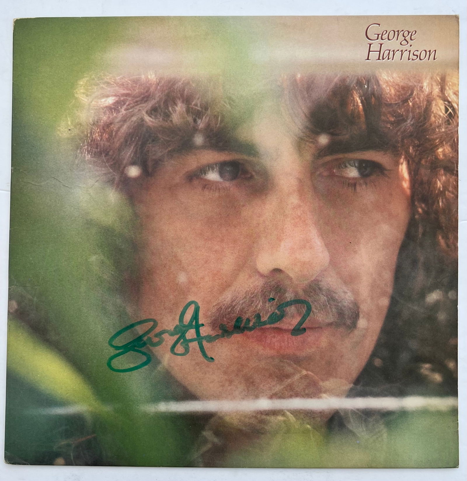 Signed George Harrison Album Cover: Signed George Harrison Album Coveris an album cover only signed by the named artist. This piece came from a private collector with unknown origination and authentication. This piece comes with the ori