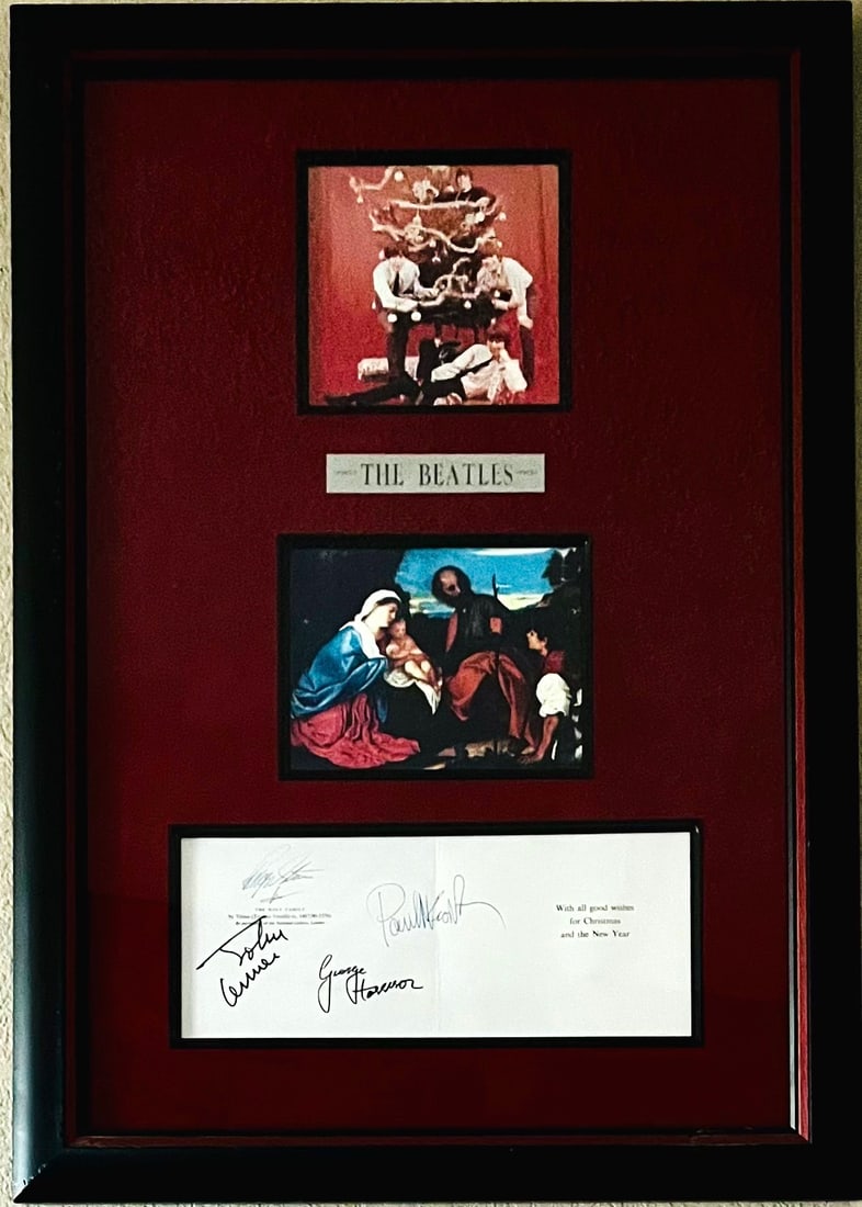 Signed The Beatles Christmas Card Plaque: Signed The Beatles Christmas Card Plaqueis a framed collectible and signed by Paul McCartney, George Harrison, Ringo Starr, John Lennon. Due to the reflective nature of the glass, some textures viewed