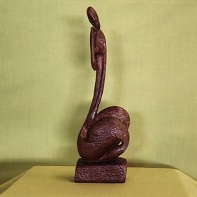 Woman Looking Down - Haitian Wood Carving by Ludovic Booz
